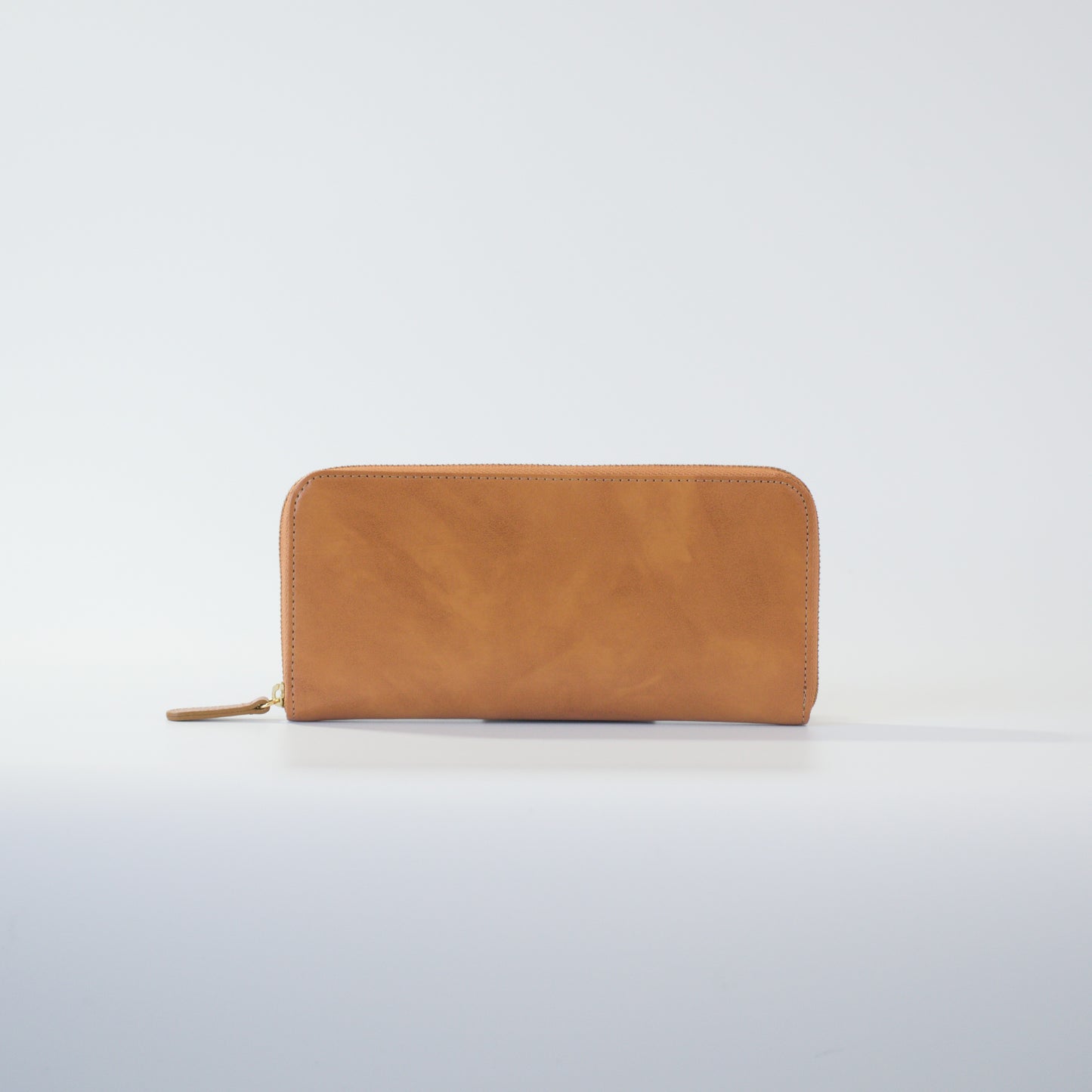 ムラ染めレザーのラウンドファスナー長財布