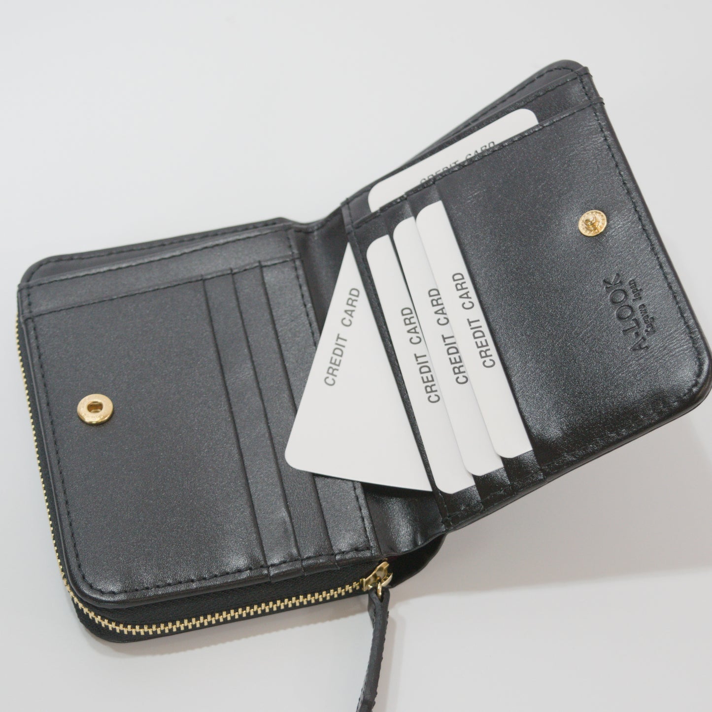 ムラ染めレザーのラウンドファスナー短財布