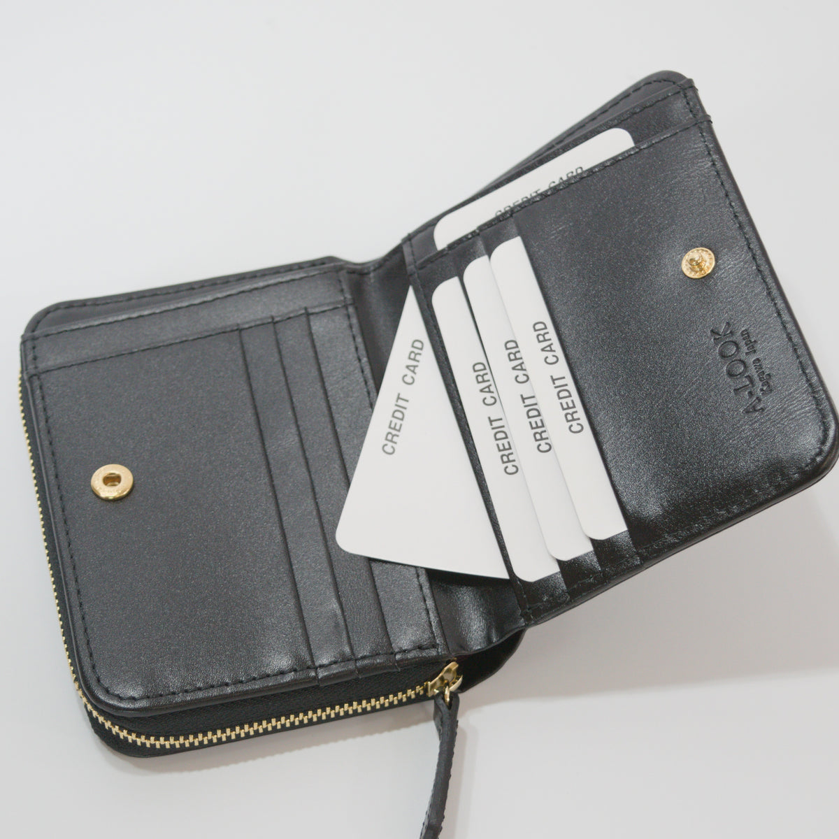 ムラ染めレザーのラウンドファスナー短財布