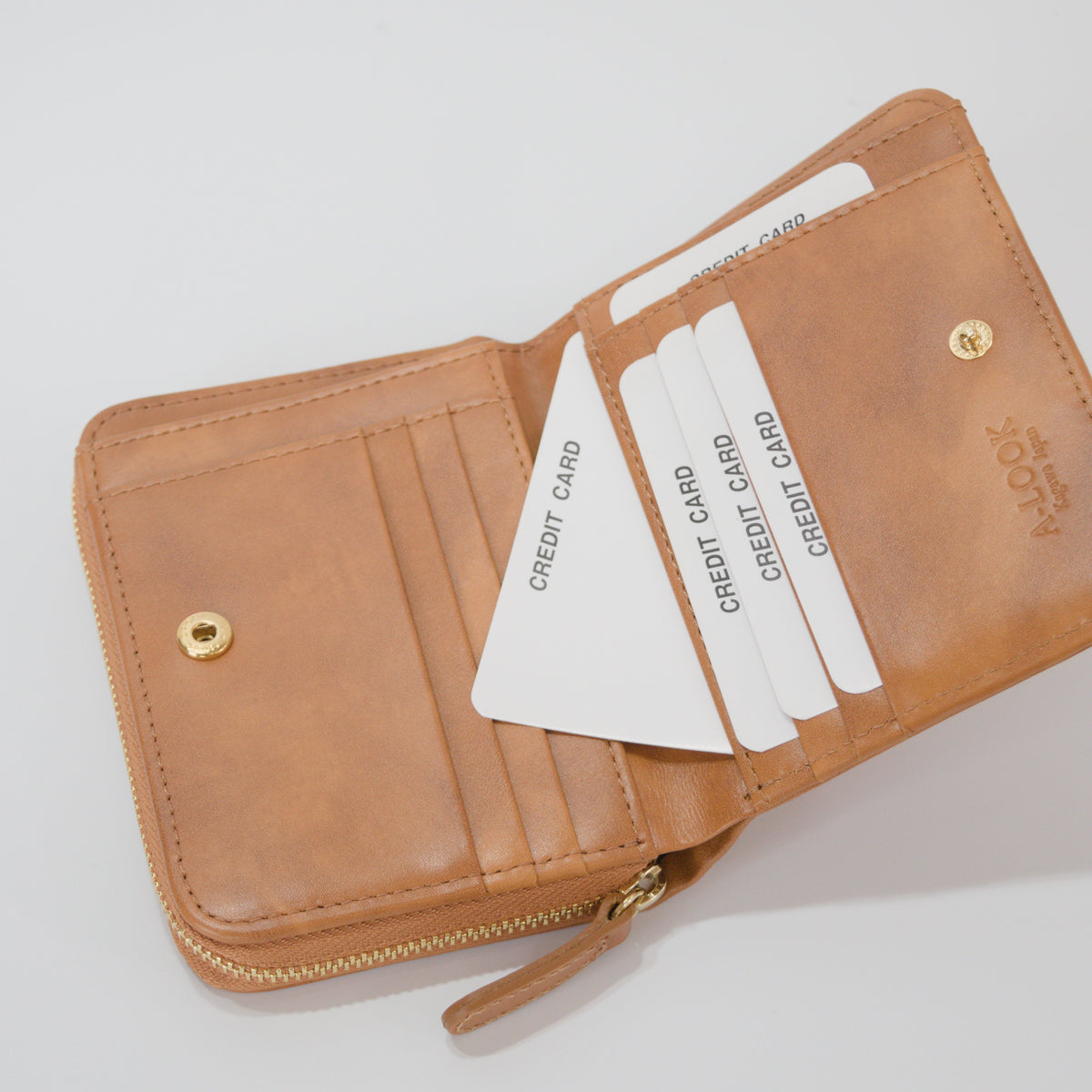 ムラ染めレザーのラウンドファスナー短財布