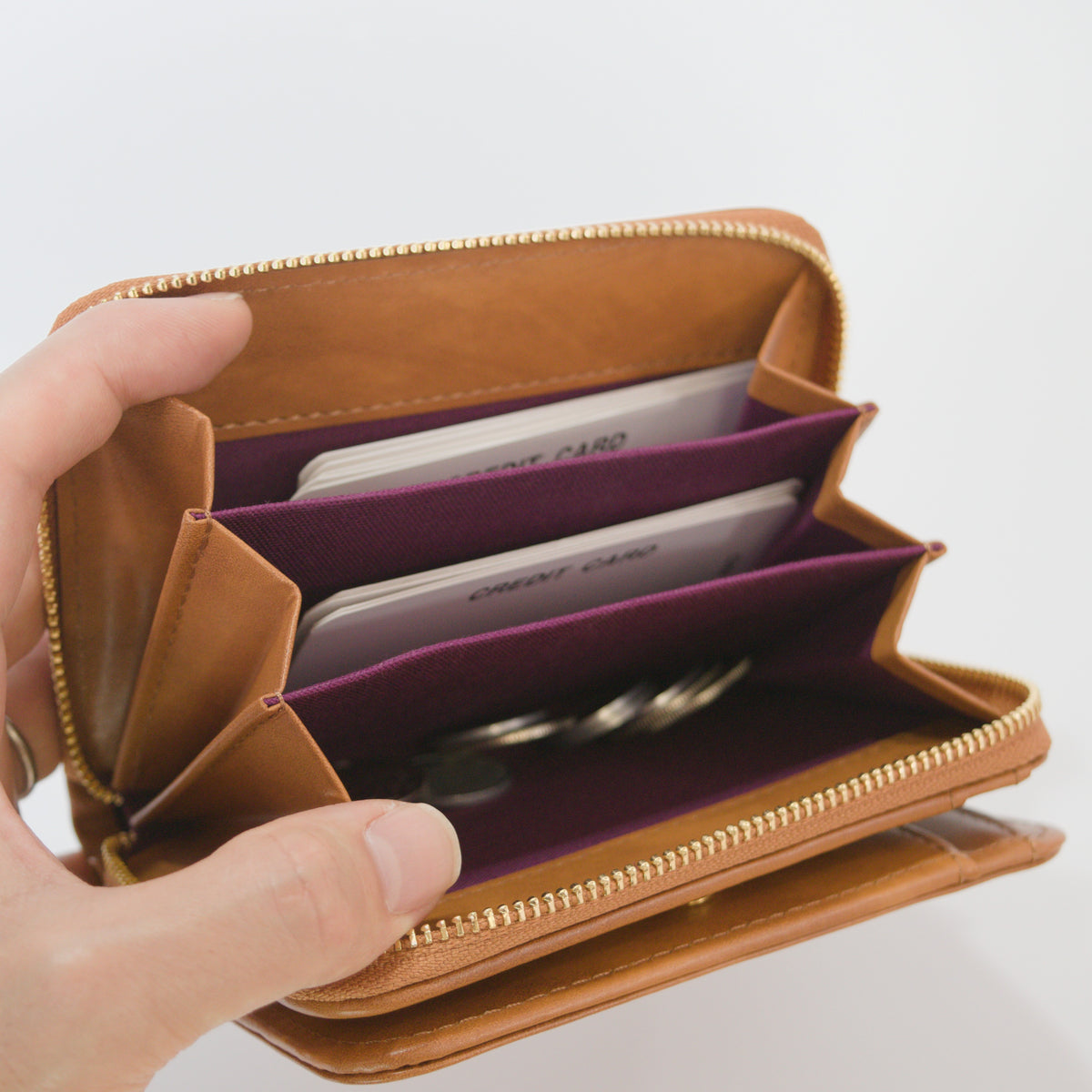 ムラ染めレザーのラウンドファスナー短財布