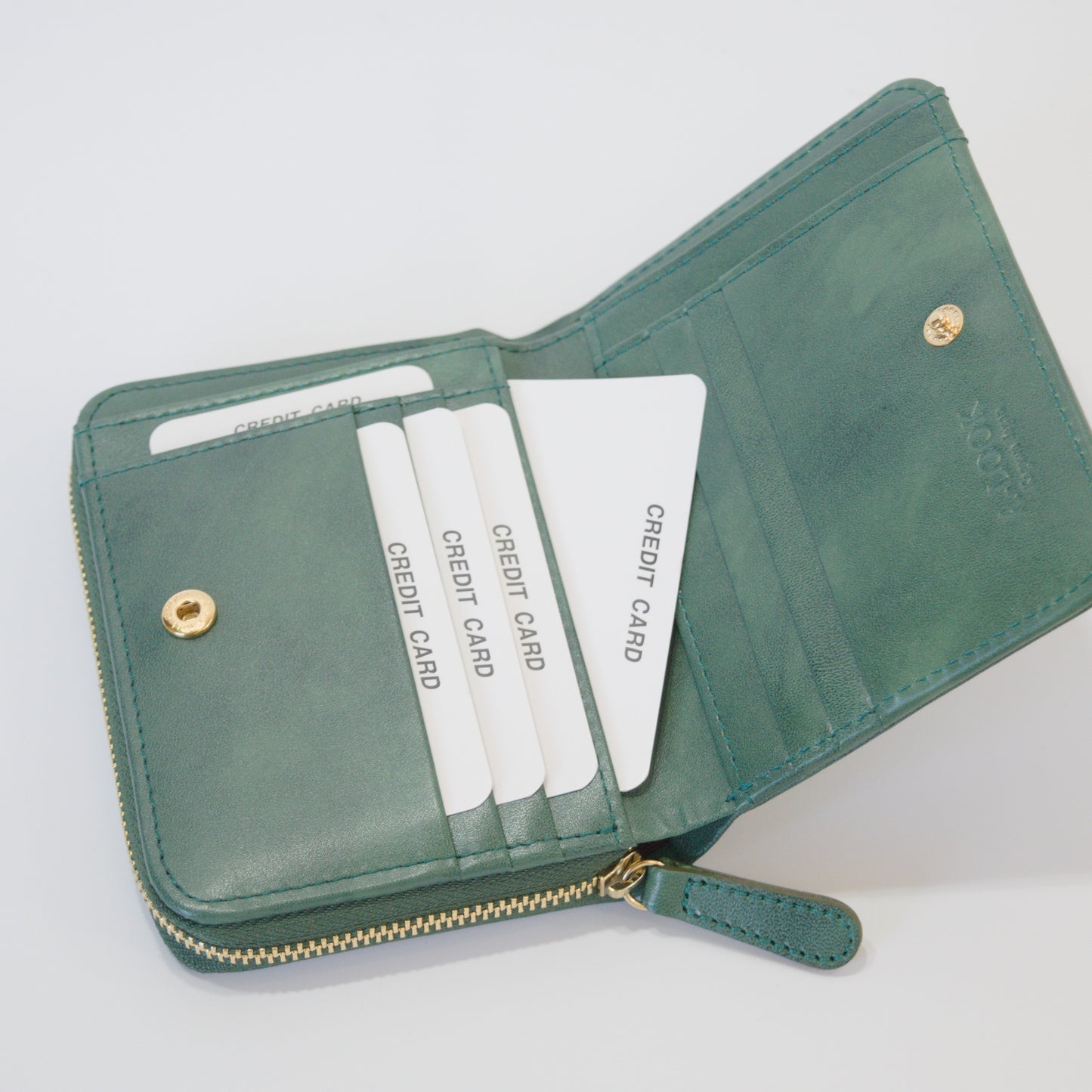 ムラ染めレザーのラウンドファスナー短財布