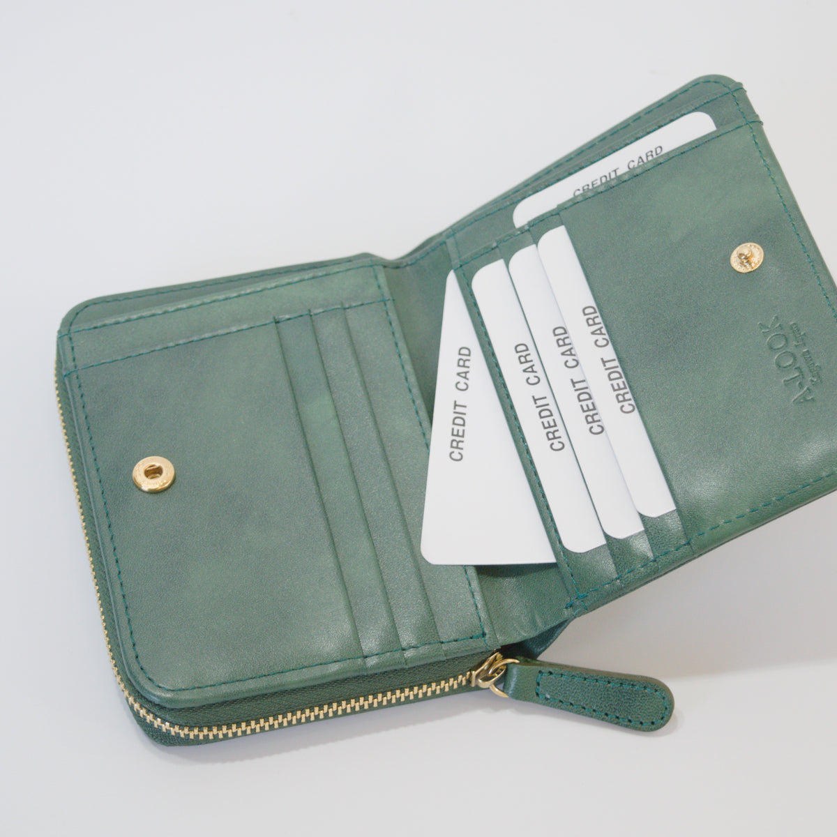 ムラ染めレザーのラウンドファスナー短財布