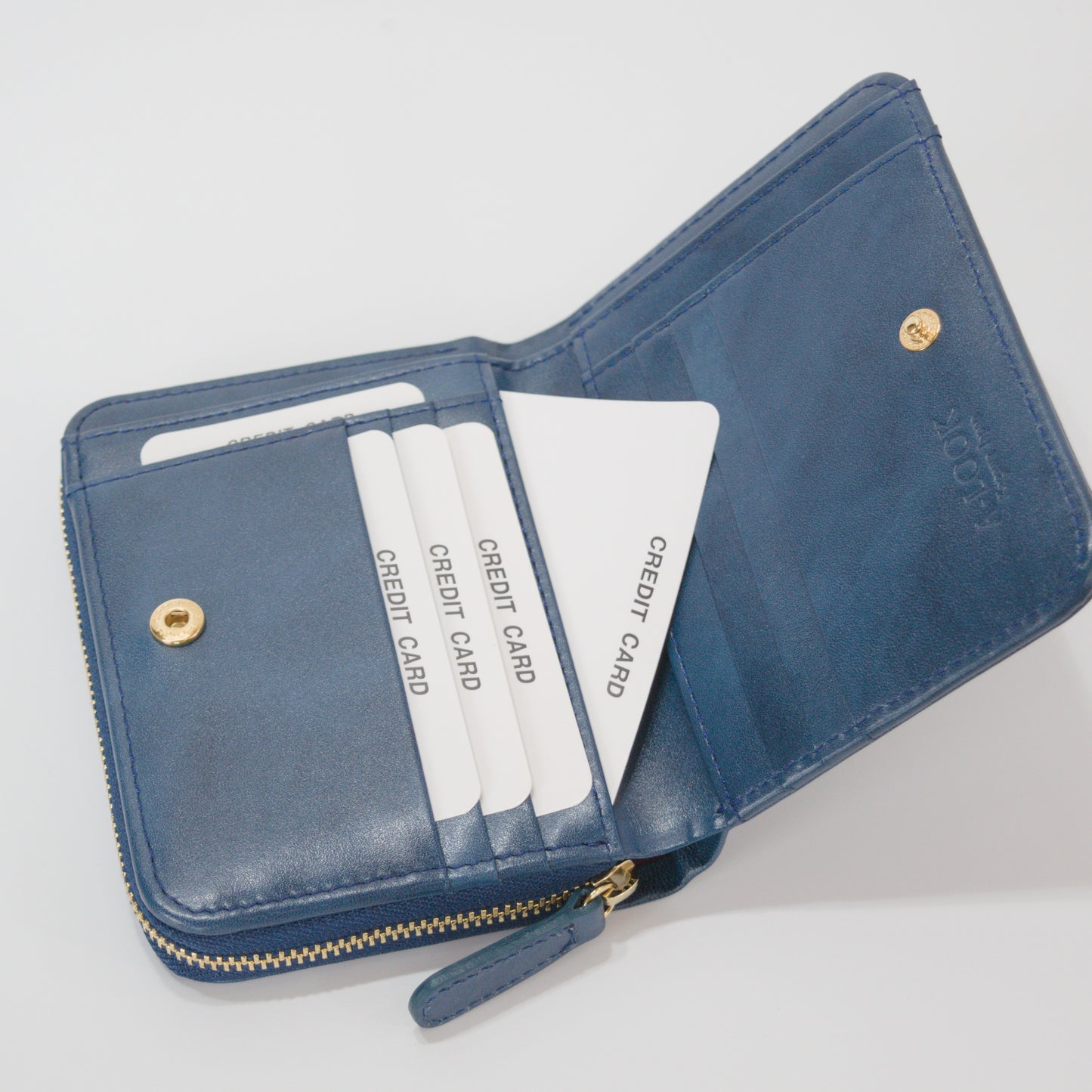 ムラ染めレザーのラウンドファスナー短財布