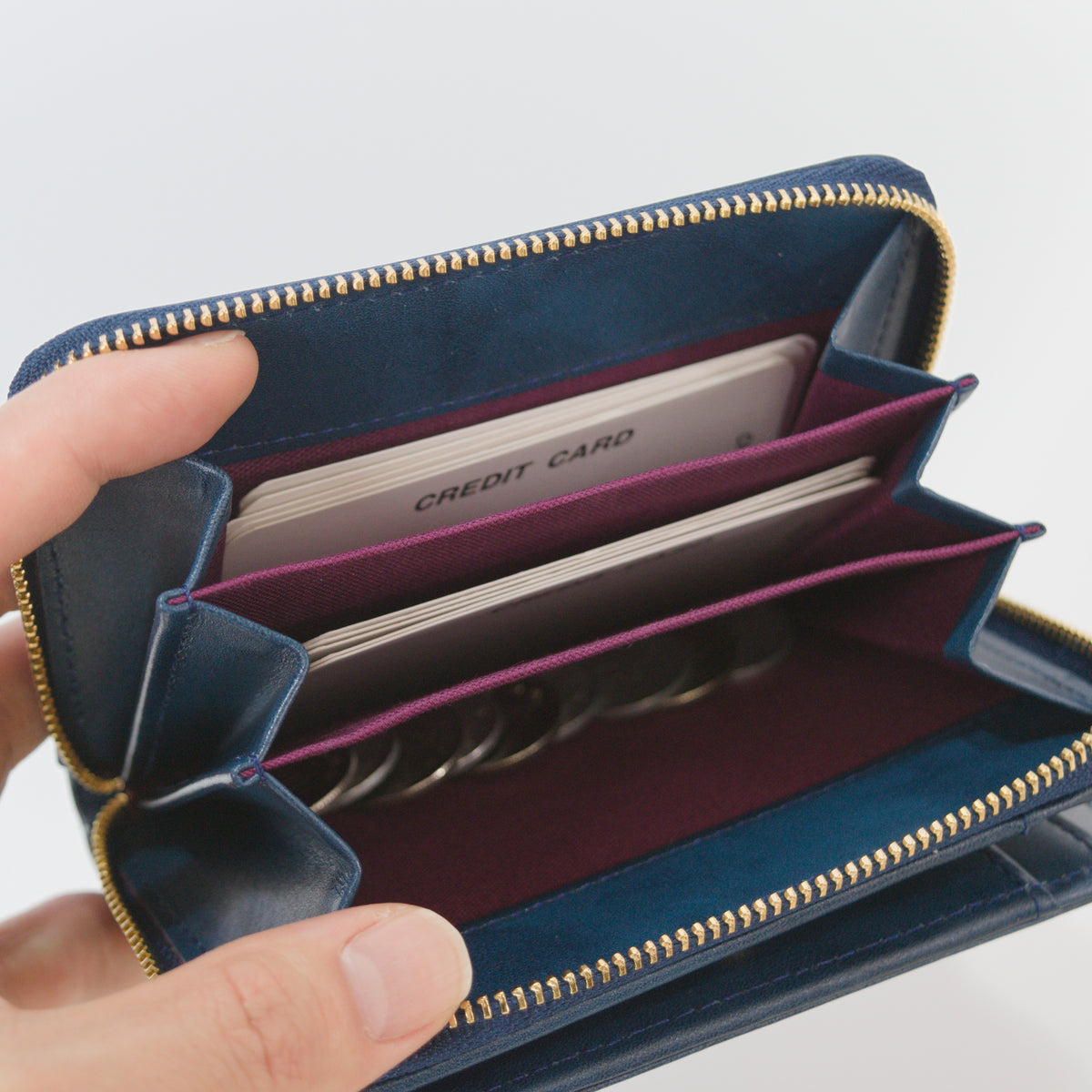 ムラ染めレザーのラウンドファスナー短財布