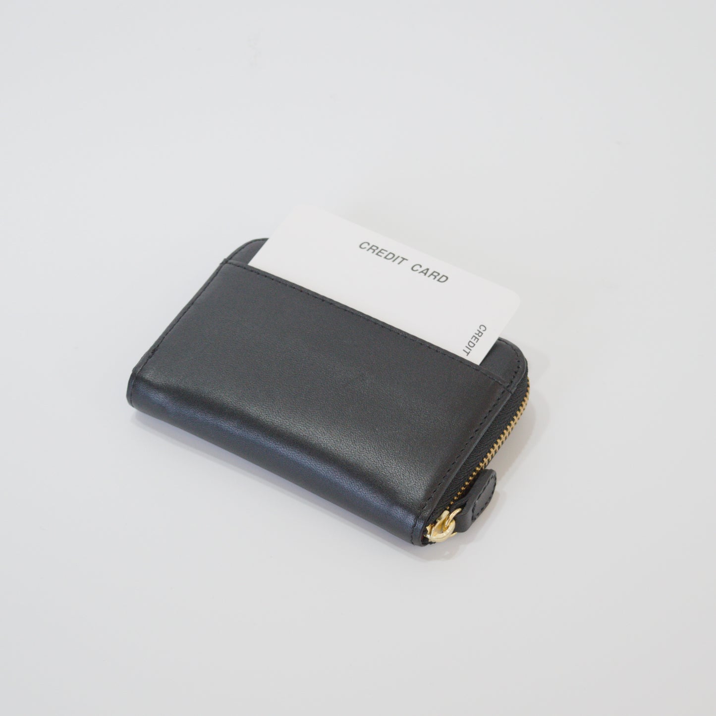 ムラ染めレザーのラウンド小銭入れ