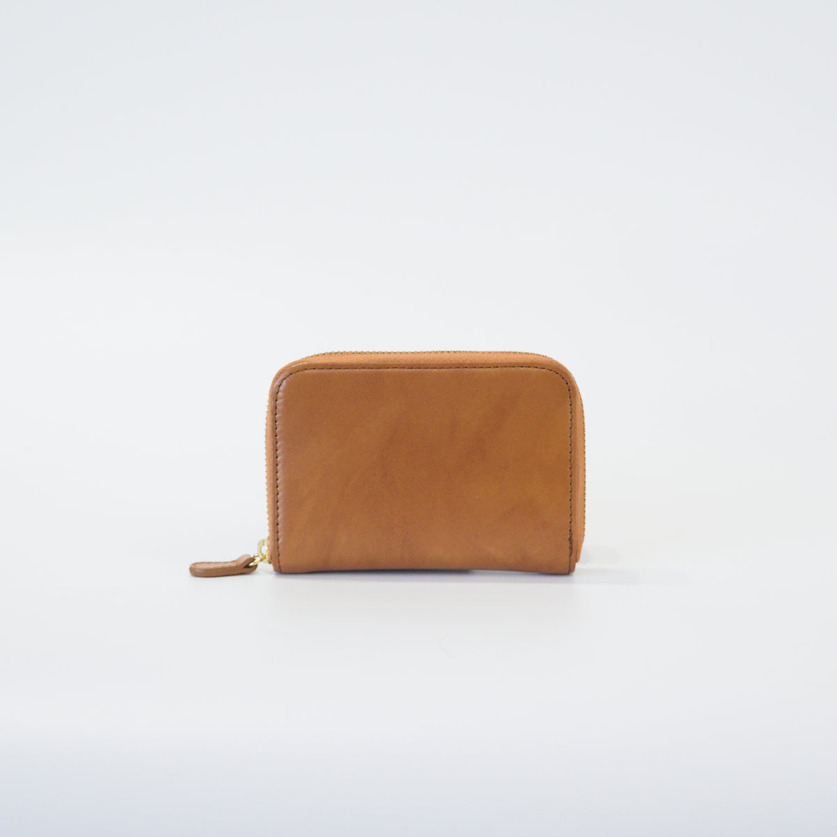 ムラ染めレザーのラウンド小銭入れcolor：Camel