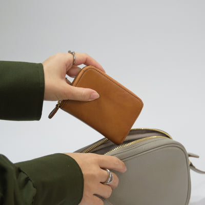 ムラ染めレザーのラウンド小銭入れ