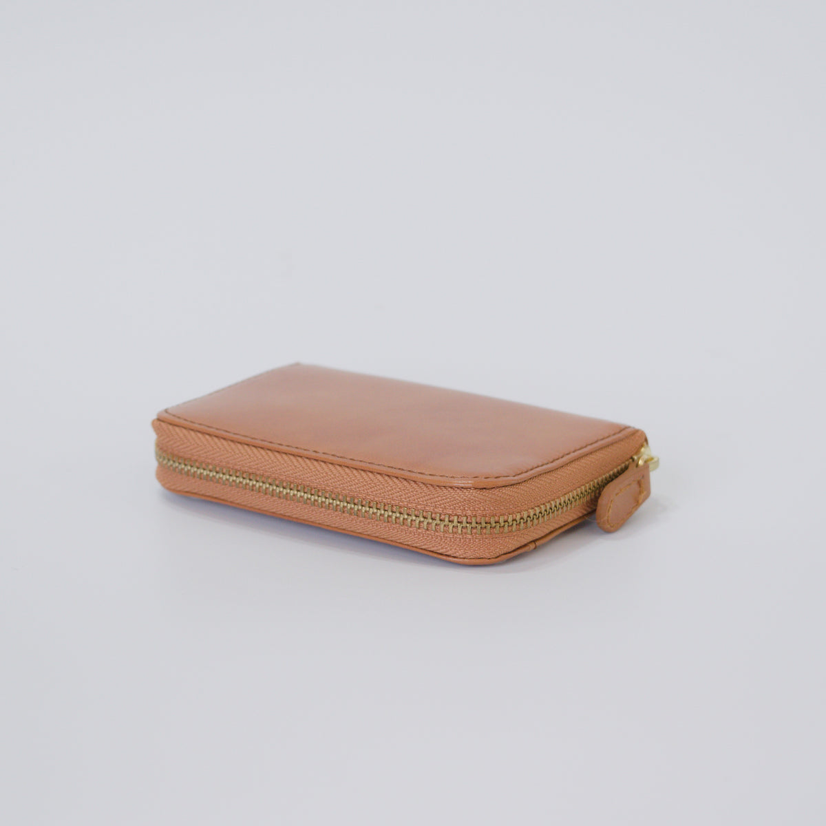 ムラ染めレザーのラウンド小銭入れ