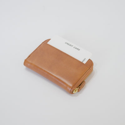 ムラ染めレザーのラウンド小銭入れ