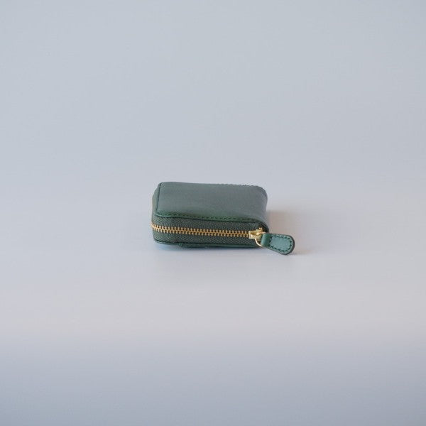 ムラ染めレザーのラウンド小銭入れ