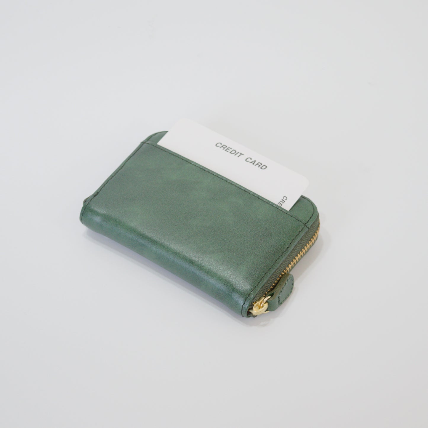 ムラ染めレザーのラウンド小銭入れ