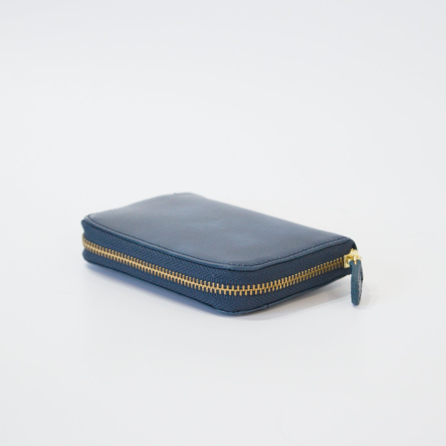 ムラ染めレザーのラウンド小銭入れ