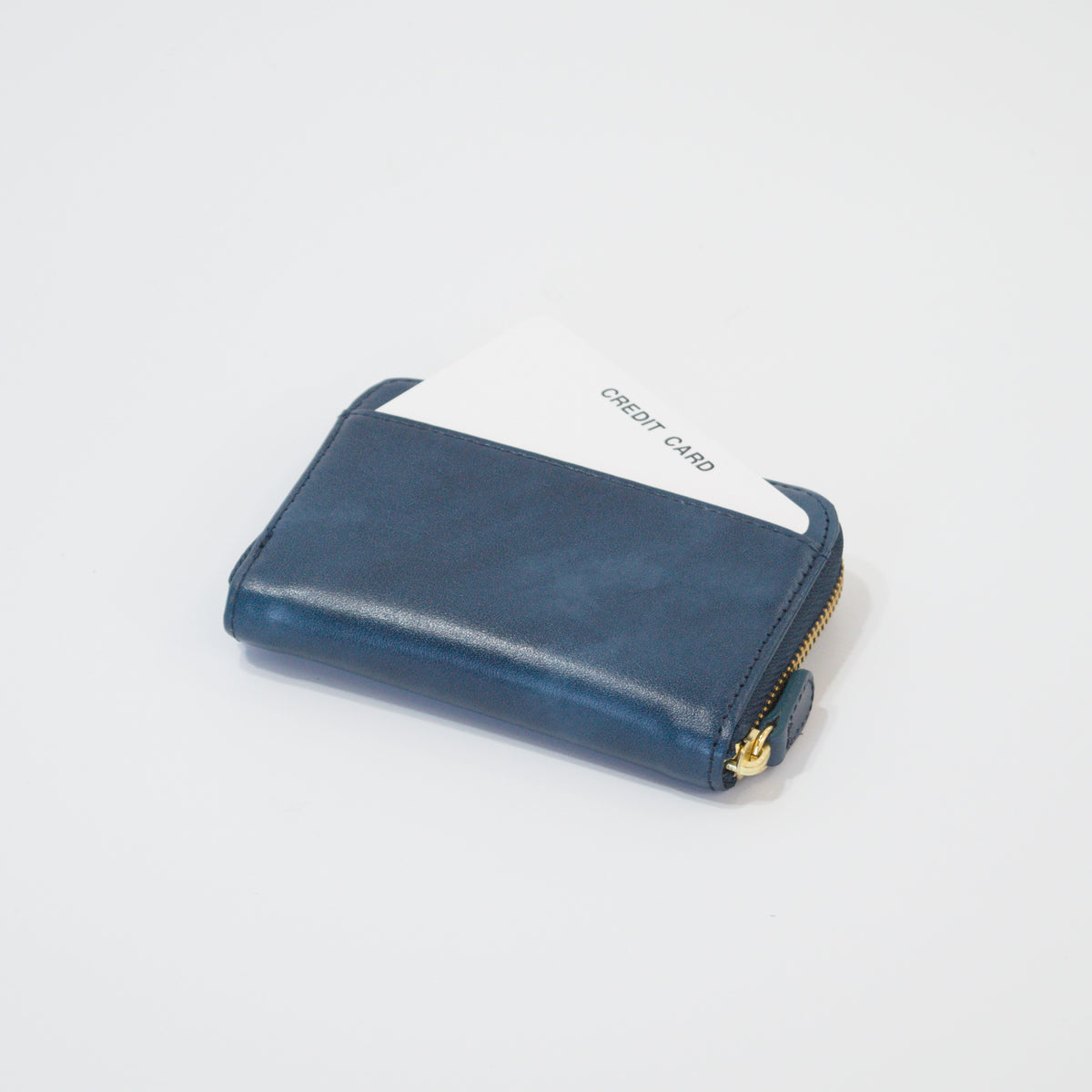 ムラ染めレザーのラウンド小銭入れ